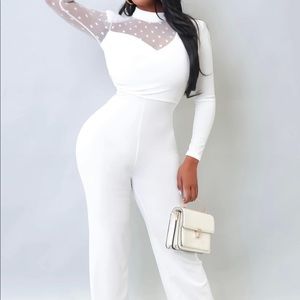 White Jumpsuit with one sleeve shear.